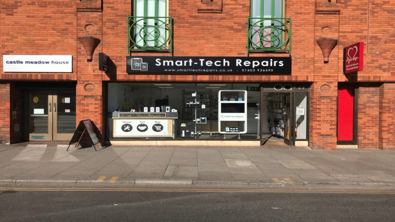 Smart-Tech Repairs storefront offering phone, tablet, and laptop repairs
